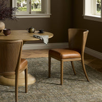 Skye Dining Chair in Sonoma Chestnut with a smooth, curved back and leather seat.