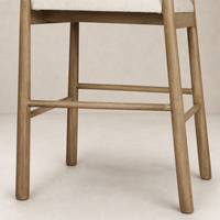 Seoul Bar + Counter Stool in Lynchart Sand with wooden legs and comfortable seat.