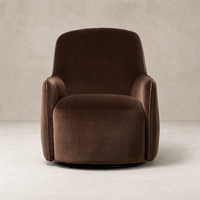 Paloma Swivel Chair in Surrey Cocoa with a plush velvet finish and rounded edges.