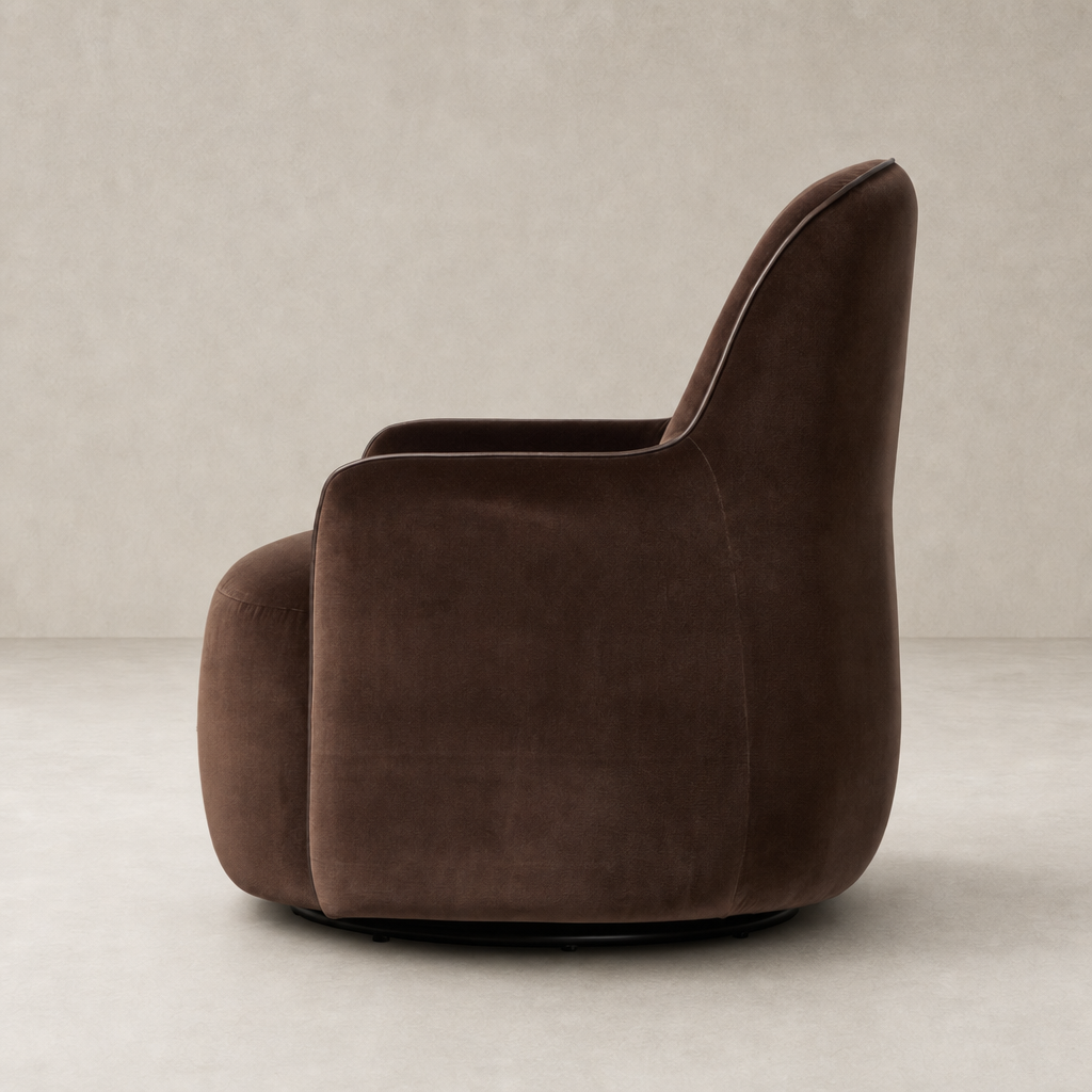 Paloma Swivel Chair in Surrey Cocoa with smooth, plush upholstery and sleek curved design.