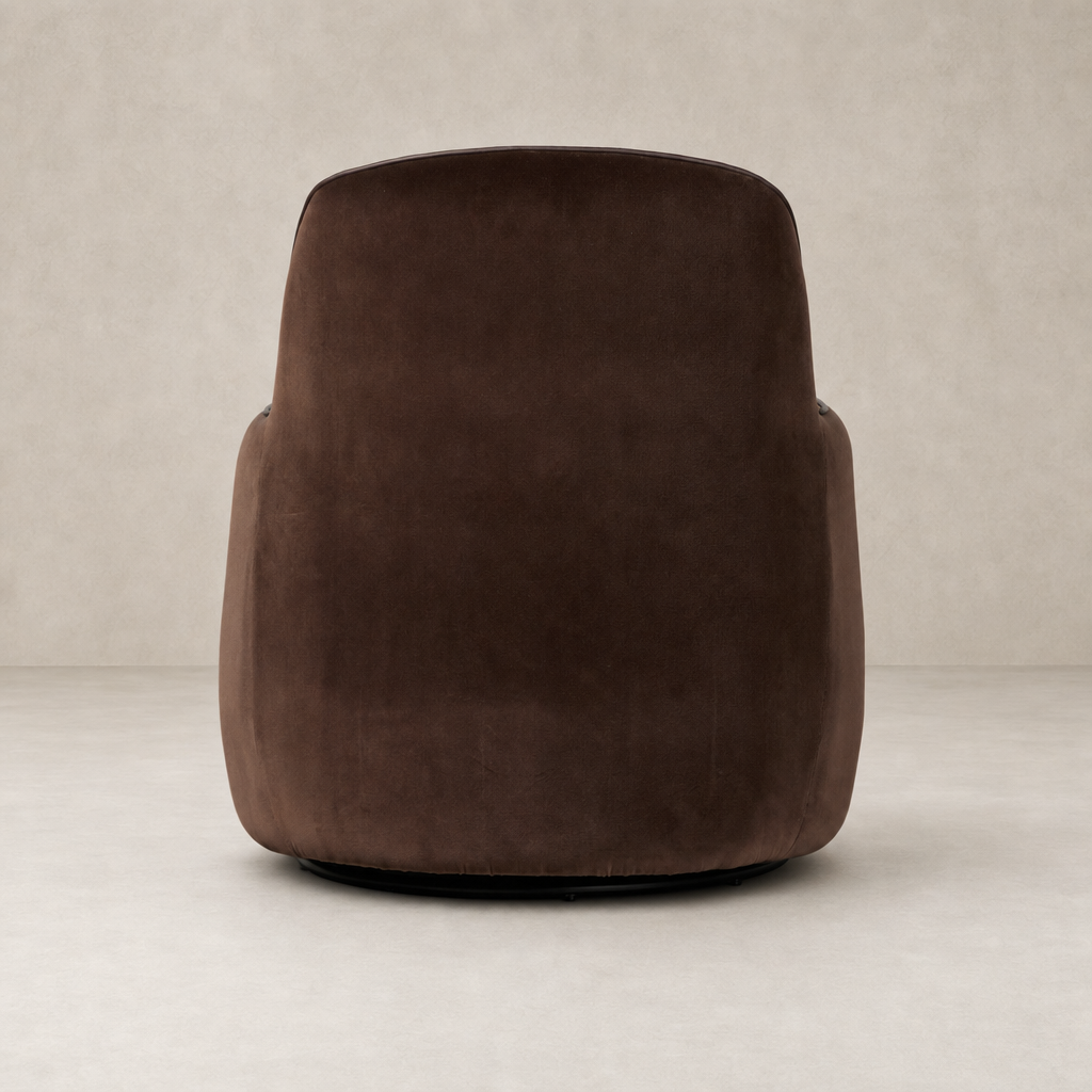 Paloma Swivel Chair in Surrey Cocoa with a smooth, rounded back design.