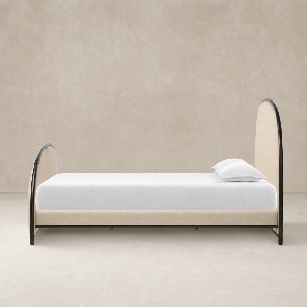 Savoy Parchment bed with curved edges and a minimalist design.