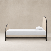 Savoy Parchment bed with curved edges and a minimalist design.