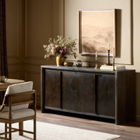 Side angle of the Lazuli Sideboard in a warm, inviting setting with decorative accents.