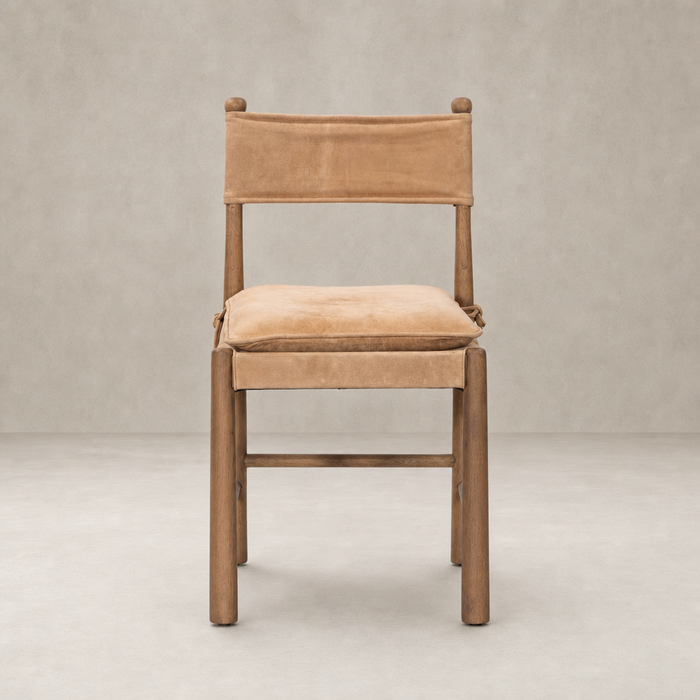 Winchester Beige dining chair with a simple, modern design and soft cushions.
