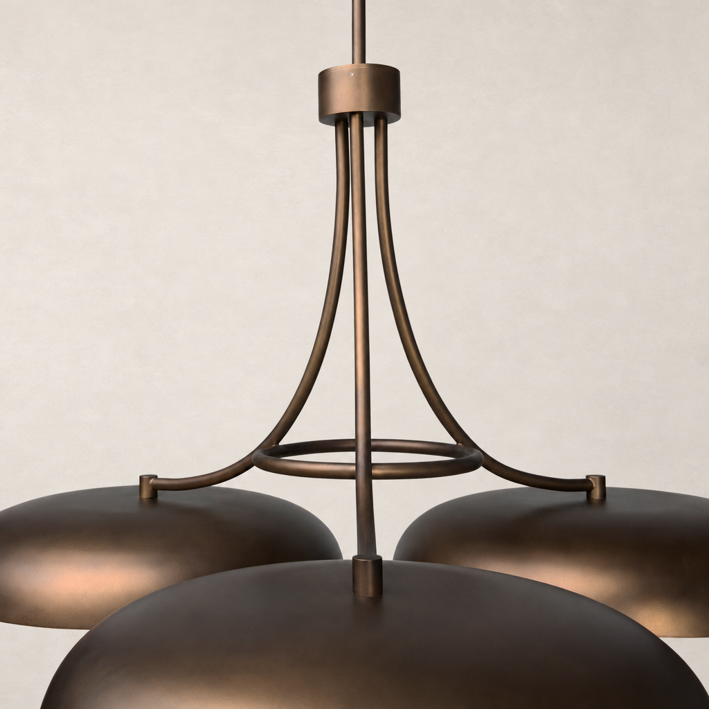 Elegant oil rubbed bronze chandelier with a modern design and curved arms.