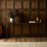Blythe Console Table in a cozy setting, featuring a sleek metal frame and rustic wood top.