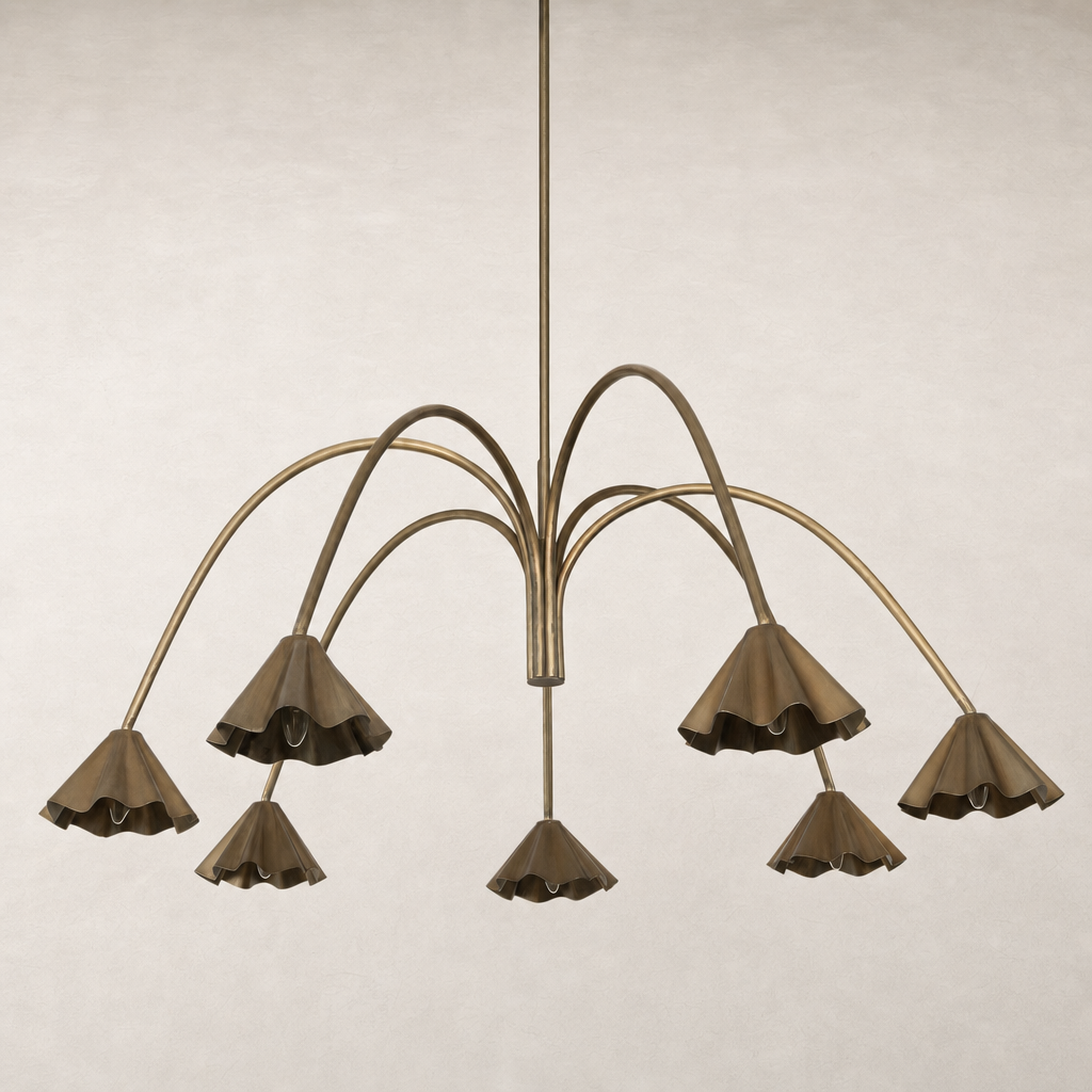 Aged antique brass iron chandelier with elegant fluted shades and sweeping arms.
