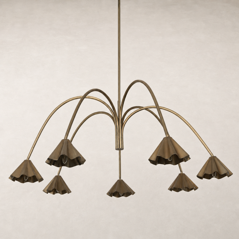 Aged antique brass iron chandelier with elegant fluted shades and sweeping arms.