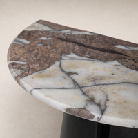 Bianca End Table features a sophisticated marble top with intricate natural veining.