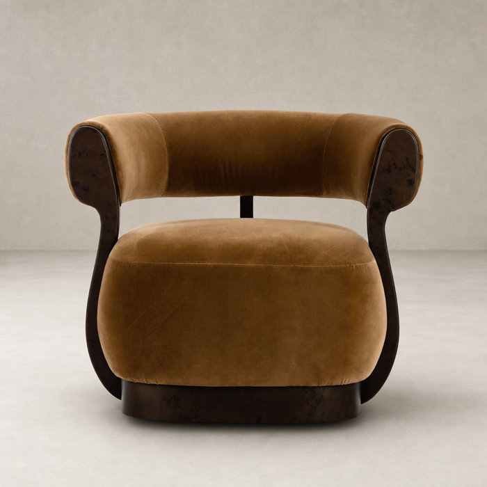 Bodhi Swivel Chair in Surrey Ochre featuring plush velvet and stylish curved arms.