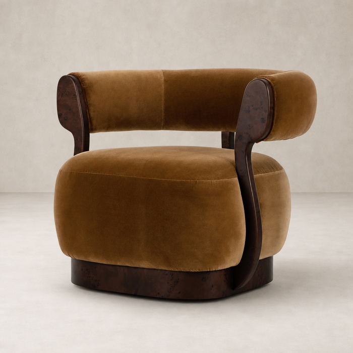 Bodhi Swivel Chair in Surrey Ochre with plush velvet upholstery and curved wooden arms.