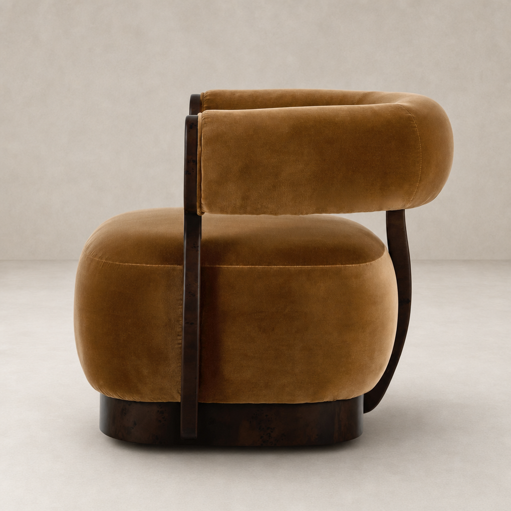 Bodhi Swivel Chair in Surrey Ochre with plush upholstery and curved wooden armrest.