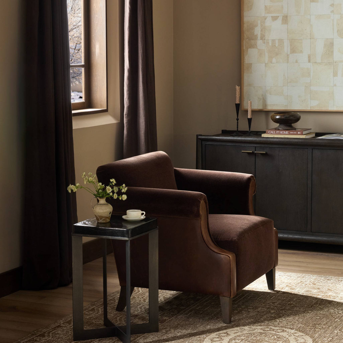 Serena Chair in Monte Chocolate, featuring sleek curved lines and rich upholstery.