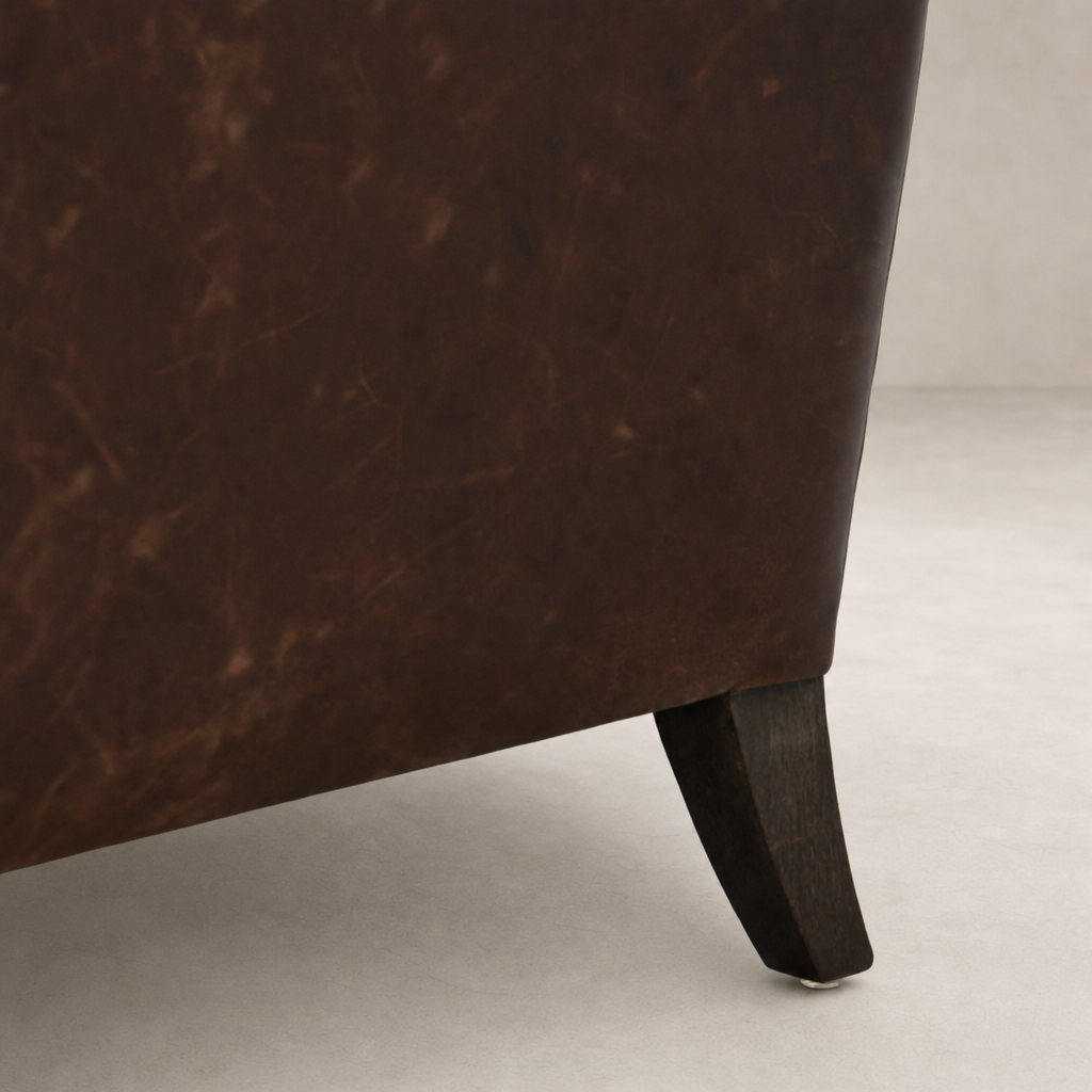 Rich Monte Chocolate upholstery of the Serena Chair showcases a stylish, textured finish.