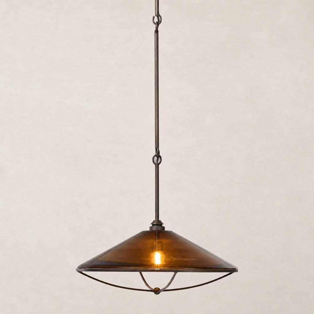 Amber glass pendant light with a sleek conical shape and modern metal frame.