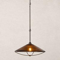 Amber glass pendant light with a sleek conical shape and modern metal frame.