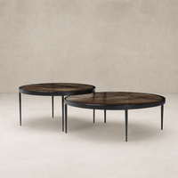 Kiko Nesting Tables - Set of 2 in smoked brown cast glass with sleek black metal legs.