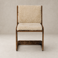 Ingrid Dining Chair in beige shorn shearling with a textured seat and woven frame.
