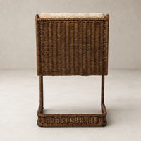 Beige Shorn Shearling Ingrid Dining Chair with woven basket-style base.