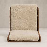 Ingrid Dining Chair in beige shorn shearling with a modern, textured design.
