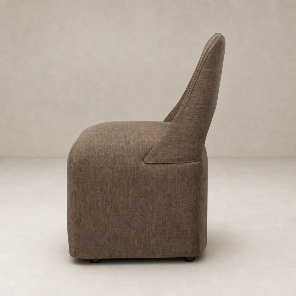 Huxley Dining Chair in Laughlin Cafe with soft, rounded edges and comfortable upholstered finish.