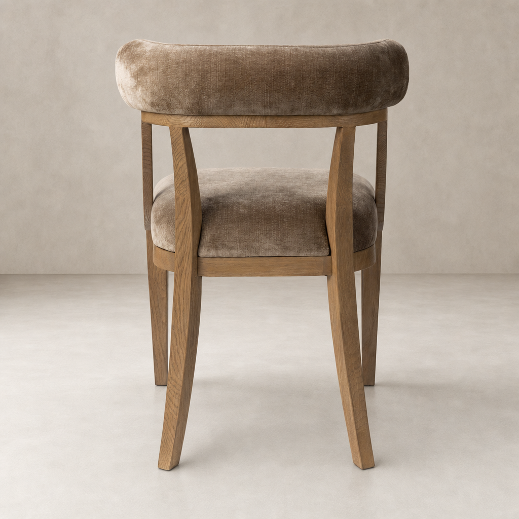Altair Mushroom dining chair with plush upholstery and sleek wooden legs.