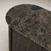 Close-up of the Paolo Sideboard's dark brown acacia wood and smooth, rounded marble top.