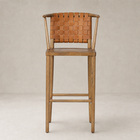 Berlin Bar + Counter Stool in Haven Tobacco featuring a woven leather back and sturdy wooden frame.