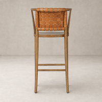Berlin Bar + Counter Stool in Haven Tobacco with woven leather backrest and wooden frame.