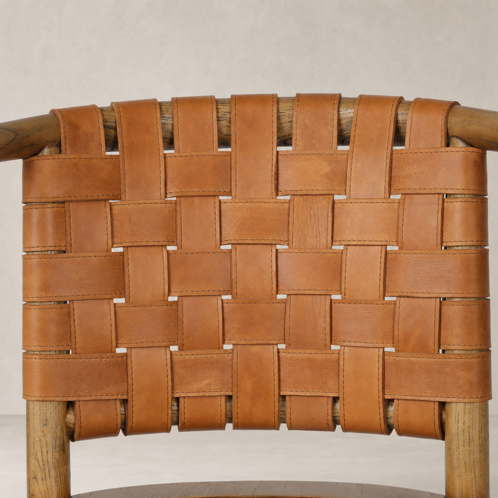 Close-up of the Berlin Bar + Counter Stool's woven Haven Tobacco leather back.