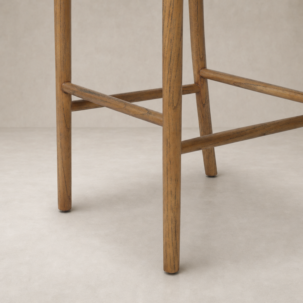 Berlin Bar + Counter Stool in Haven Tobacco featuring sturdy wooden legs and elegant cross braces.