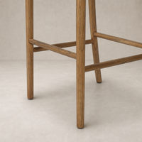 Berlin Bar + Counter Stool in Haven Tobacco featuring sturdy wooden legs and elegant cross braces.