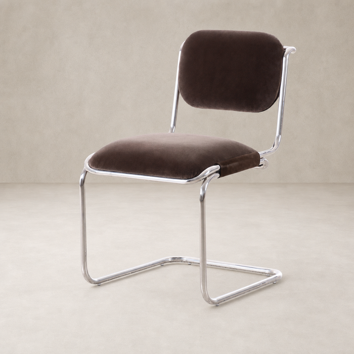 Surrey Mink dining chair with sleek chrome frame and plush upholstery.