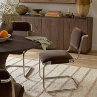 Surrey Mink dining chair with a sleek chrome frame in a modern dining setting.