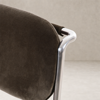 Surrey Mink dining chair with sleek chrome frame and plush velvet upholstery.