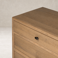 Sandy oak 6 drawer dresser with smooth lines and a sleek finish.