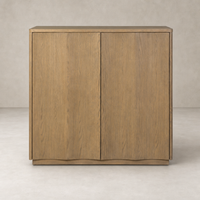 Felix Small Cabinet in drifted oak featuring sleek lines and minimalistic design.
