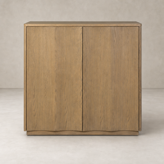 Felix Small Cabinet in drifted oak featuring sleek lines and minimalistic design.