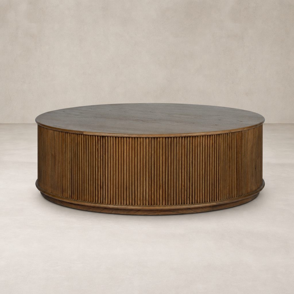 Ola Coffee Table in Amber Mindi with a round top and ribbed base.