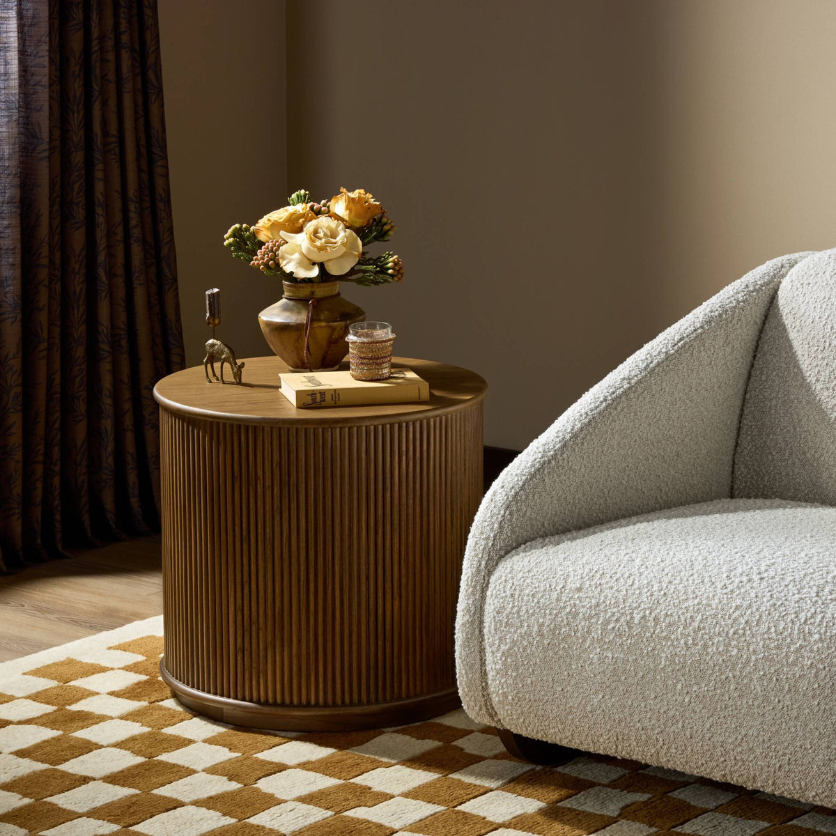 Close-up of the Luna End Table featuring a ribbed wood design, styled with decorative items.