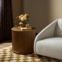Close-up of the Luna End Table featuring a ribbed wood design, styled with decorative items.