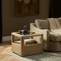 Silas End Table in light wood with a glass top, accentuating modern design.
