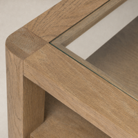 Elegant Silas End Table showcasing a smooth wooden finish with glass top.