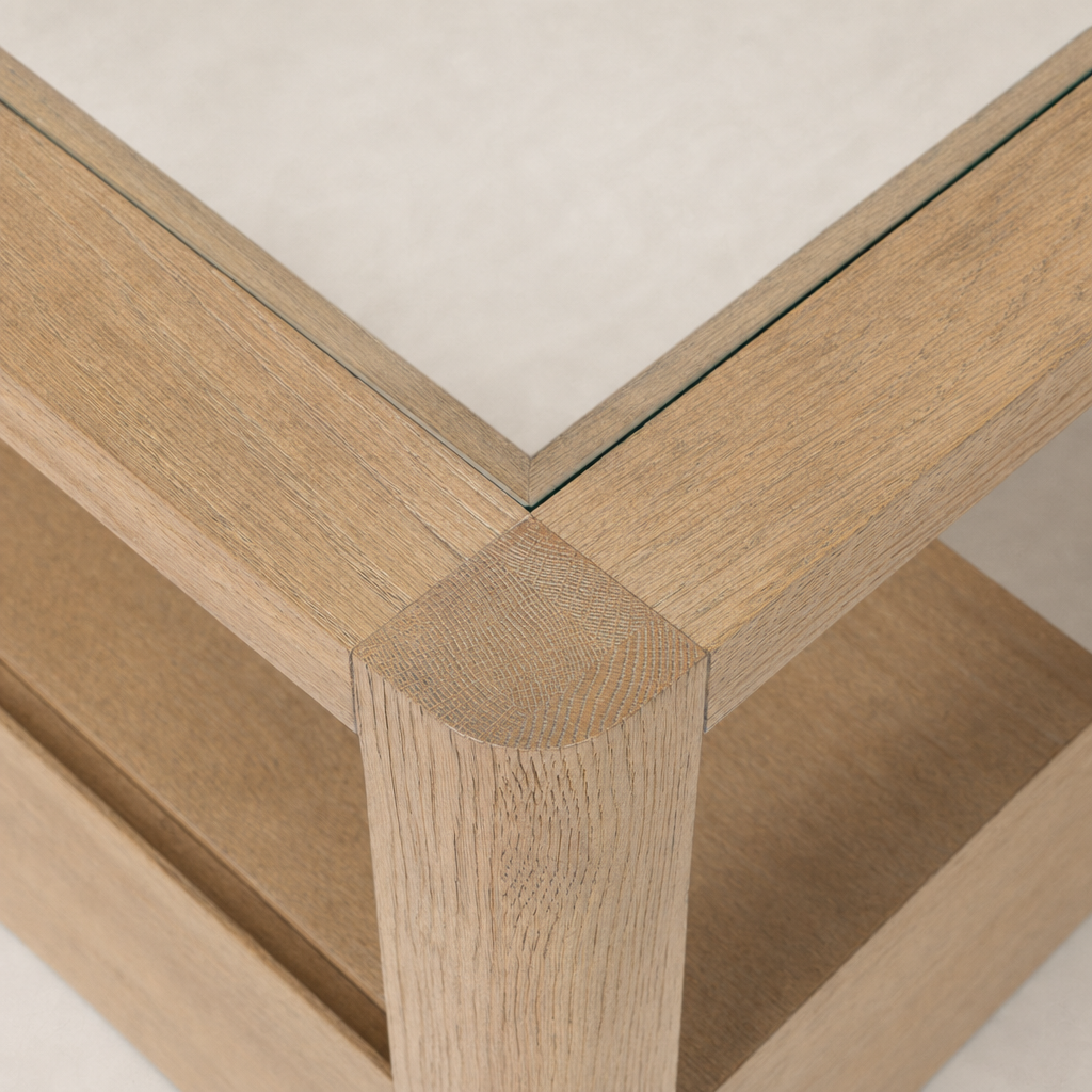 Close-up of the Silas End Table's textured wood finish and sleek glass top.