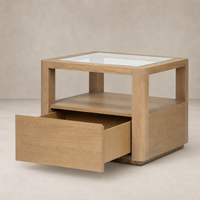 Silas End Table featuring a glass top and wood finish with a spacious drawer.