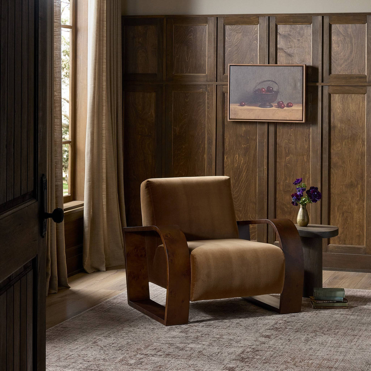 Orchid Chair in Surrey Ochre with wooden arms, set in a warm, inviting room.