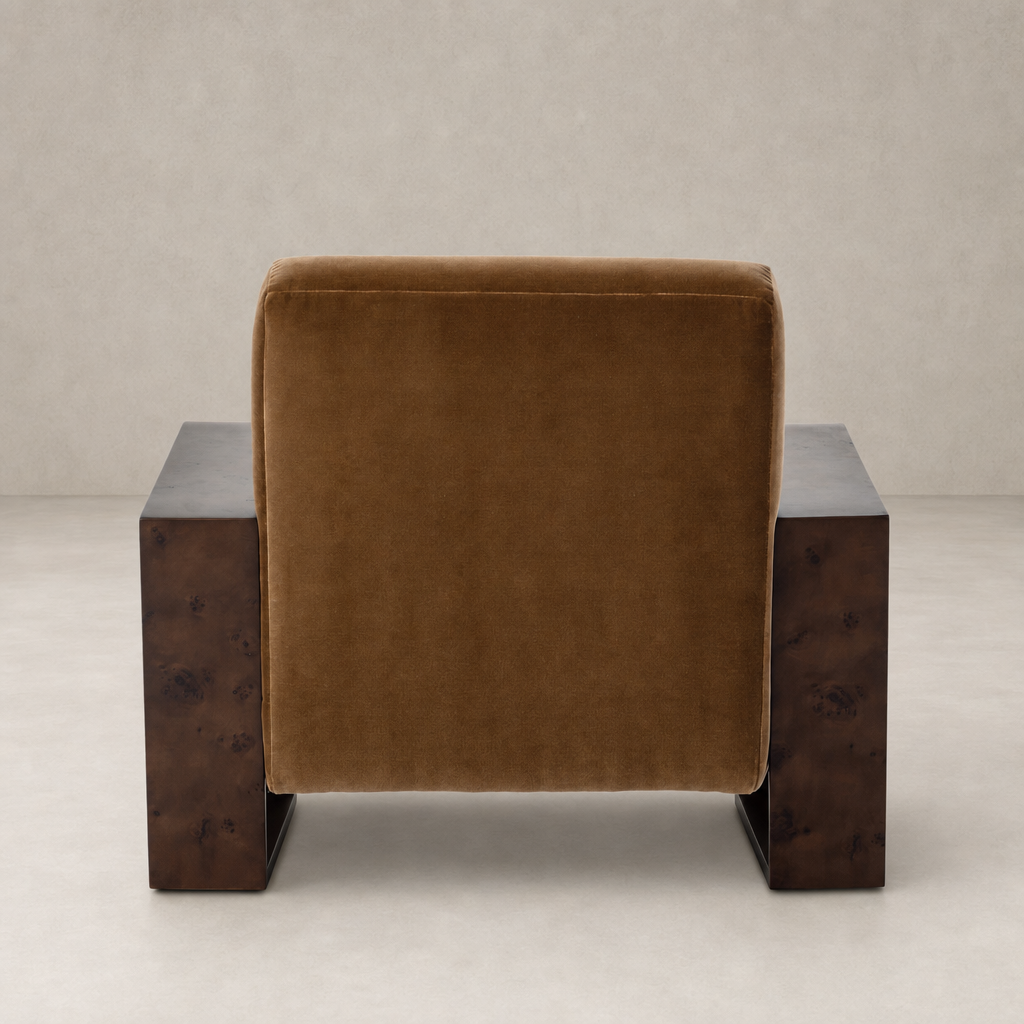 Orchid Chair in Surrey Ochre with plush upholstery and sleek wood accents.