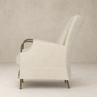 Side view of the Ada Chair in Bergamo Parchment with sleek lines and metal accents.