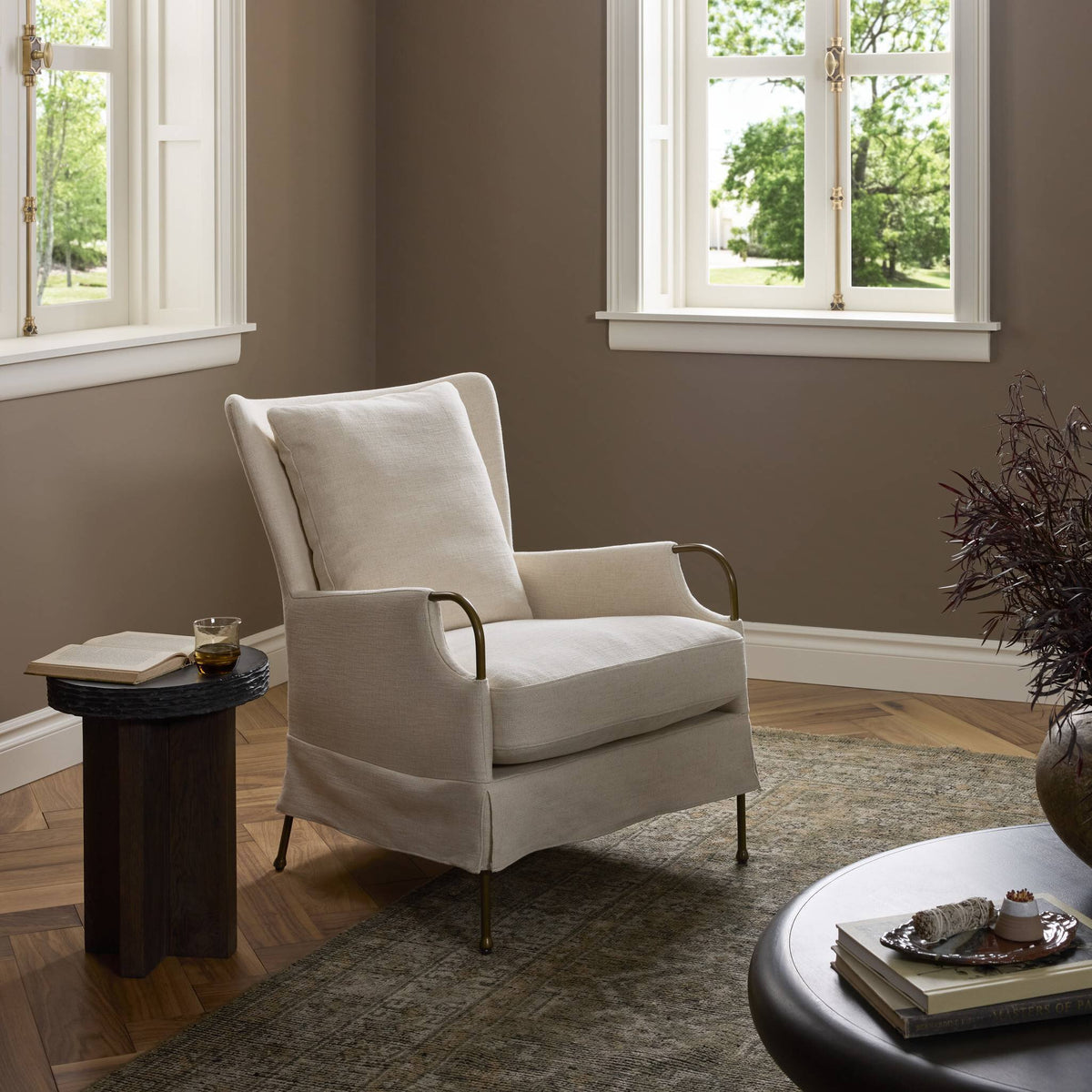 Ada Chair in Bergamo Parchment fabric, featuring elegant armrests and plush cushioning.
